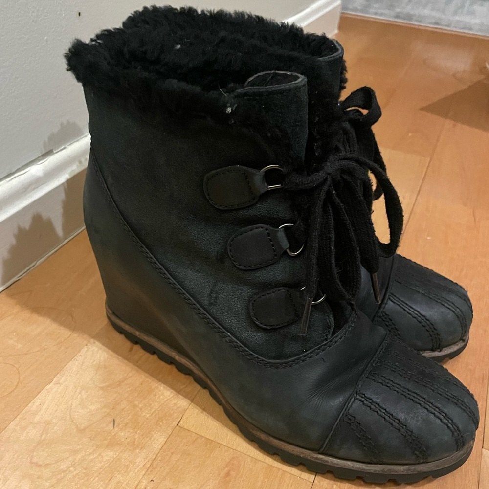 Ugg ankle wedge lace up bootie. Genuine shearling. Waterproof.